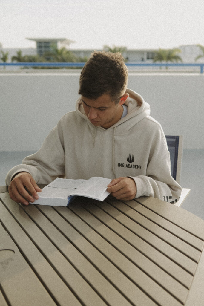 Jack Blyth reading his Bible